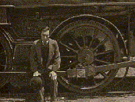 Buster Keaton åker tåg.